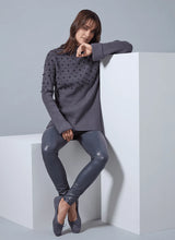 Load image into Gallery viewer, These Vegan Leather leggings are made from stretchy Textured Faux Leather, boasting a body hugging fit and a concealed signature waistband that offers a smooth, flattering silhouette. In a versatile charcoal color, they complement a wide array of your preferred tops beautifully.