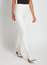 Load image into Gallery viewer, These Vegan Leather leggings are made from stretchy Textured Faux Leather, boasting a body hugging fit and a concealed signature waistband that offers a smooth, flattering silhouette. In a versatile off-white hue known as chalk, they complement a wide array of your preferred tops beautifully.