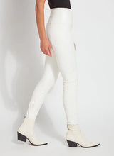 Load image into Gallery viewer, These Vegan Leather leggings are made from stretchy Textured Faux Leather, boasting a body hugging fit and a concealed signature waistband that offers a smooth, flattering silhouette. In a versatile off-white hue known as chalk, they complement a wide array of your preferred tops beautifully.