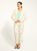 Load image into Gallery viewer, Turn heads with this eye-catching textured blazer, featuring a delightful ditsy floral print that exudes charm and grace. The notched lapel and long sleeves provide a classic structure, while the high-quality fabric offers both comfort and style. Ideal for layering over casual or formal attire, this blazer is the perfect blend of feminine sophistication and modern versatility.