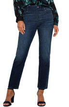 Load image into Gallery viewer, Model wearing dark blue jeans, floral green top and black sandals against a white background.
