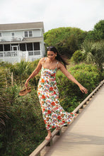 Load image into Gallery viewer, Romantic and refined, the Paloma Dress by Smith & Quinn is your go-to for effortless elegance. Shown in the painterly Evetide Garden print, this sleeveless silhouette features a flattering square neckline, fitted bodice, and a softly flared skirt that moves with grace. Crafted from S&Q Signature Stretch fabric, it offers breathable comfort, wrinkle resistance, and a polished finish that transitions seamlessly from day to evening.