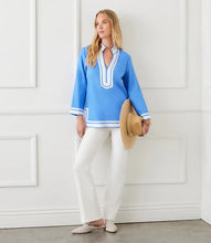 Load image into Gallery viewer, Channel effortless coastal elegance with the Karen Kane St. Tropez Tunic. Crafted from a lightweight linen-viscose blend, this breezy tunic offers a relaxed silhouette with chic grosgrain ribbon trim. Perfect for warm-weather styling, it pairs beautifully with jeans or leggings for a sophisticated yet casual look. Whether you're strolling along the beach or heading out for brunch, this versatile tunic ensures comfort and style in every step.