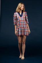 Load image into Gallery viewer, A perennial favorite with a fresh twist, the Tory Dress by Smith & Quinn returns in the breezy Coastal Plaid print. This tiered tunic silhouette features a relaxed fit, flattering V-neckline, and three-quarter puff sleeves for a touch of feminine charm. Crafted from S&Q Signature Stretch fabric, it offers breathable comfort, wrinkle resistance, and effortless polish—perfect for warm-weather outings, casual gatherings, or travel-ready style.