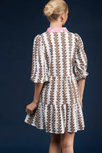 Load image into Gallery viewer, Step into timeless style with The Tory Dress in Coconut Vine by Smith & Quinn. This easy tiered tunic neck shift dress features 3/4 puff sleeves, adding a touch of sophistication to your wardrobe. Made from S & Q's Signature Stretch fabric, this dress is wrinkle-resistant and machine washable, ensuring both comfort and practicality. Perfect for any occasion, this dress is a must-have addition to your collection. Pair it with your favorite accessories for a chic and effortless look.