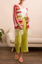 Load image into Gallery viewer, The Tribal Three-Quarter Sleeve Open-Front Crochet Sweater with Fringe is a stylish and breezy layering piece designed for effortless elegance. Featuring a delicate crochet knit and playful fringe detailing, this sweater adds texture and movement to any outfit. Ideal for pairing with jeans, dresses, or swimwear, the Tribal Three-Quarter Sleeve Open-Front Crochet Sweater with Fringe is a must-have for chic, laid-back styling.