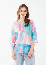 Load image into Gallery viewer, Embrace effortless style with FDJ French Dressing’s drop shoulder jersey top. Featuring a chic boat neckline, 3/4 sleeves, and a modern geo print in beautiful pastel colors, this lightweight, relaxed-fit piece adds a touch of elegance to any wardrobe. Perfect for casual outings or layering up in style!