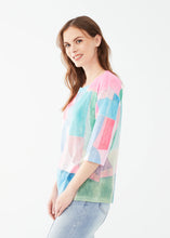 Load image into Gallery viewer, Embrace effortless style with FDJ French Dressing’s drop shoulder jersey top. Featuring a chic boat neckline, 3/4 sleeves, and a modern geo print in beautiful pastel colors, this lightweight, relaxed-fit piece adds a touch of elegance to any wardrobe. Perfect for casual outings or layering up in style!