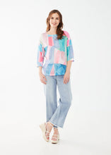 Load image into Gallery viewer, Embrace effortless style with FDJ French Dressing’s drop shoulder jersey top. Featuring a chic boat neckline, 3/4 sleeves, and a modern geo print in beautiful pastel colors, this lightweight, relaxed-fit piece adds a touch of elegance to any wardrobe. Perfect for casual outings or layering up in style!