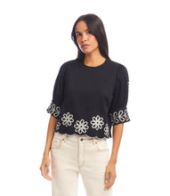 Load image into Gallery viewer, Add a touch of timeless elegance to your wardrobe with the Tesni Three Quarter Sleeve Embroidered Scallop Top by Karen Kane. Featuring delicate floral embroidery, a scalloped hem, and chic puff sleeves, this sophisticated blouse offers a graceful yet modern look for any occasion. Perfect for brunch, workdays, or an evening out, this lightweight embroidered top pairs effortlessly with jeans, skirts, or tailored pants.
