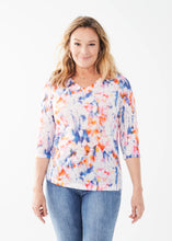 Load image into Gallery viewer, Get ready to dazzle and delight with the FDJ French Dressing Tawny Three Quarter V-Neck Top in a stunning Petal Reflections print. This top is all about effortless elegance and vibrant style, making it a standout piece in any wardrobe.
