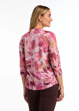 Load image into Gallery viewer, This top showcases a striking abstract pattern in vibrant pink shades and is crafted from luxuriously smooth fabric, making it a versatile piece that easily complements any ensemble for a modern aesthetic.