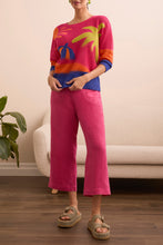 Load image into Gallery viewer, The Tribal Teya Three-Quarter Sleeve Crochet Sweater in Very Berry is the perfect blend of cozy comfort and effortless style. With its delicate crochet detailing and vibrant berry hue and pops of eye-catching color, this sweater is designed to make a statement while keeping you feeling fabulous. Pair it with jeans or shorts for a casual day out or layer it over a dress for a sophisticated touch.