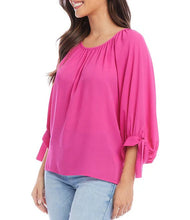 Load image into Gallery viewer, Enhance your wardrobe with this scoop neck peasant top that features ties on roll sleeves. Made from luxurious silky crepe polyester with an elegant drape, it can be your go-to choice for both casual and chic occasions.
