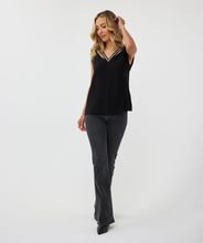Load image into Gallery viewer, The Thyra Top by EsQualo offers a stylish look with its flattering V-neck silhouette and delicate beading embellishments. Created with high-quality materials, this top is perfect for both casual and formal occasions, adding a touch of elegance to any outfit. Wear it with denim or layer it under a jacket or blazer to complete the look.
