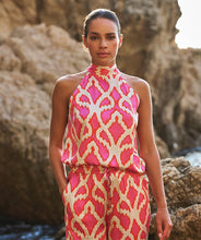 Load image into Gallery viewer, The EsQualo Tirsa Top Halter Disco Spark is a dazzling statement piece designed for effortless elegance and modern flair. Featuring a halter neckline and a vibrant print, this top offers a chic and sophisticated silhouette, perfect for both casual and dressy occasions. Pairs effortlessly with tailored pants, skirts, or denim for a stylish look.