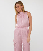 Load image into Gallery viewer, Sleek, soft, and summer-ready—the Svea Halter Top brings effortless elegance to any warm-weather look. Crafted from EsQualo’s signature silky-touch fabric in a dreamy pastel pink, it features a halter neckline with delicate gathering and a flowing, relaxed silhouette. Lightweight and breezy, it’s perfect for layering under a blazer or pairing with the matching silky cargos for a chic tonal ensemble.