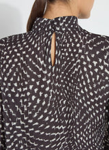Load image into Gallery viewer, The Topacio Embellished High Neck Blouse, crafted from silky printed lightweight satin, features precise construction, crystal rhinestone adornments, and a back keyhole with a self-covered button. The crystals, applied exclusively to the front panel, are heat-set following the pattern cutting.