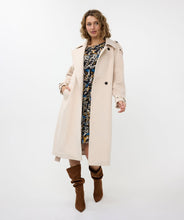 Load image into Gallery viewer, Classic, chic, and timeless, this stunning EsQualo Trenchcoat in a beautiful bisquit color is a must-have. The chic long trench coat features a bow belt and beautiful button details on the hem, sleeves, and shoulders, making it a perfect blend of elegance and sophistication.