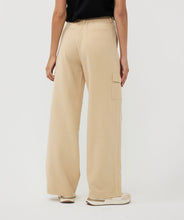 Load image into Gallery viewer, Constructed with cargo pockets and a trendy wide leg fit, these Tanner Trousers from EsQualo offer both comfort and style. The tan (sand) color complements most tops and the elastic waistband ensures a comfortable fit. Perfect for any fashion-forward wardrobe.