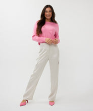 Load image into Gallery viewer, Upgrade your wardrobe with these stylish cargo trousers in a sophisticated light stone color. The satin finish adds a touch of elegance, making these trousers perfect for both casual and semi-formal occasions. Designed with a comfortable fit and versatile style, they can be paired effortlessly with sneakers for a relaxed look or heels for a chic, polished outfit.