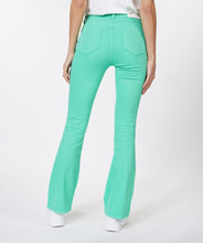 Load image into Gallery viewer, Color, color and more color! A beautiful flair basic denim pant in a striking jade green color is a must-have this season. These pants taper to a wider leg and functional five pockets. Color- Jade green. Tapers to wider leg. Functional five pockets. Silver buttons and hardware. EsQualo Jeans label. Fabric-97% Cotton. 3% Spandex.