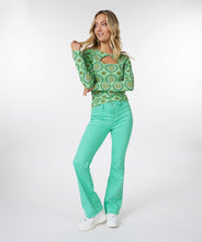 Load image into Gallery viewer, Color, color and more color! A beautiful flair basic denim pant in a striking jade green color is a must-have this season. These pants taper to a wider leg and functional five pockets. Color- Jade green. Tapers to wider leg. Functional five pockets. Silver buttons and hardware. EsQualo Jeans label. Fabric-97% Cotton. 3% Spandex.