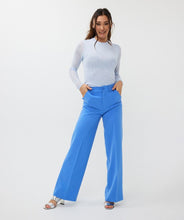 Load image into Gallery viewer, These beautiful electric blue wide leg trousers are adorned with clean pleated seams on the front and back, giving off a sophisticated and refined appearance. The elastic waistband allows for a comfortable and flattering fit. Suitable for both casual and formal events, these trousers make a versatile wardrobe addition.