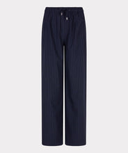 Load image into Gallery viewer, Navy pinstripe pants against aa light gray background.