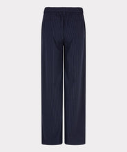 Load image into Gallery viewer, Navy pinstripe pants against aa light gray background.