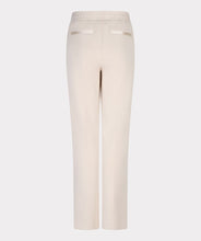 Load image into Gallery viewer, Beige pants against a white background.