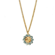 Load image into Gallery viewer, Show off your shimmering style with the Twiggy Necklace in Aqua and Champagne! This floral design necklace from Canadian makers is designed with an antique gold-plated brass base metal and adorned with high-quality crystals. You'll turn heads and be ready to shine when you style this beautiful piece. Color- Aqua, champagne, gold. Premium crystals. Antique gold plating over brass. Length- 19.5 inches with two-inch extender.