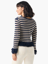 Load image into Gallery viewer, Starting now, "rough along the edges" is officially a compliment. Inspired by the bold textural flourishes of authentic crochet, this gorgeously detailed, richly textured knit is full of dress up or dress down possibilities. Knit-in stripes of rich indigo and cream create contrast that are perfect with denim. Wear it as a top when you close the snap buttons or leave it open and pair it with an underlayer. Mindfully Made from fully fashioned knitwear to reduce fabric waste.