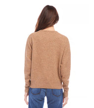 Load image into Gallery viewer, Cozy up in this soft V-neck sweater. Perfect for lounging or a casual day out. A wardrobe staple that's anything but basic.