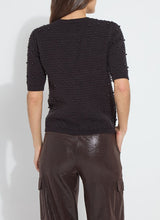 Load image into Gallery viewer, This versatile cropped sweater, made from Cozy Jacquard, showcases a 3D texture and a chunky feel. Offering short sleeves and embellished with stitched pearls, the Valentina Pearl Short Sleeve Sweater styles as well with wide-leg jeans as it does with dress pants.