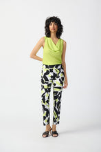 Load image into Gallery viewer, Introducing the Amaya Abstract Print Millennium Pull-On Pants by Joseph Ribkoff. Designed with a structured contour waistband and a stylish JR ornament, these cropped pants offer sophistication and comfort. Crafted from high-quality fabric, they provide both luxury and fun. Elevate your wardrobe with these bold and stylish pants. Color - Vanilla Multi - Key lime, black and vanilla. Millennium fabric. Structured contoured waistband. JR ornament detail. Unlined.