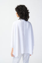 Load image into Gallery viewer, Our woven wrap top is a must-have garment that exudes confidence and grace. With dolman sleeves and a pleat detail at the neck, this top brings versatile style to your wardrobe, draping gracefully to flatter every body type. Color- Vanilla. Woven fabric. Wrap neckline. Dolman sleeves. Pleated detail at the neck. Unlined.