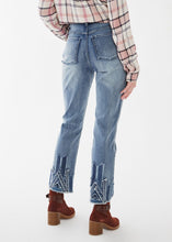 Load image into Gallery viewer, A playful hem applique detail adds a special touch to this classic blue jean, making it an ideal choice for fun and flirty Fall outfits. Color- Vintage blue. Applique detailing. Slight frayed hems. Button and zipper closure. Functional pockets.
