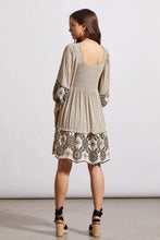 Load image into Gallery viewer, Utilize this versatile 2-in-1 dress, featuring a square front neckline and an adjustable tie-back closure, to add a personalized touch to your wardrobe. The reversible design allows for two distinct looks, while the flowy woven fabric, neutral print, and embroidered accents offer a polished yet versatile addition to any outfit.