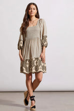 Load image into Gallery viewer, Utilize this versatile 2-in-1 dress, featuring a square front neckline and an adjustable tie-back closure, to add a personalized touch to your wardrobe. The reversible design allows for two distinct looks, while the flowy woven fabric, neutral print, and embroidered accents offer a polished yet versatile addition to any outfit.