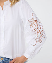 Load image into Gallery viewer, The Wita White Blouse Lace Sleeve by EsQualo features a striking openwork design on its sleeves, making it a standout choice. Its classic white color allows for versatile pairing with a variety of pants and skirts.