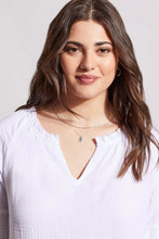 Load image into Gallery viewer, This lovely blouse is made of crinkled gauze cotton, which gives it a light and elegant touch. It features a notch neck that you can pop over, elbow-length raglan sleeves, and bell-shaped cuffs that add some playful charm.