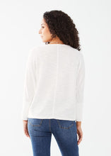 Load image into Gallery viewer, Expertly styled, this batwing top boasts a comfortable and fashion-forward design, featuring a relaxed and airy silhouette for a versatile and modern addition to your wardrobe. Adorning the sides of each sleeve are charming pastel palm trees intricately embroidered for an extra touch of style. Color- White with pastel colors. Length 24". Round neck. Embroidery details on sleeves. Ribbed cuffs. Batwing style.