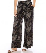 Load image into Gallery viewer, Channeling the free-spirited vibe of bohemian style, these soft pants boast a charming dotted leaf pattern that brings a whimsical flair to any outfit. Convenient side pockets and a wide-leg design provide both style and comfort, making them perfect for relaxed days at home or adventurous outings.