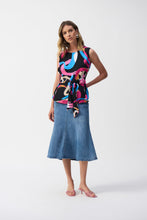 Load image into Gallery viewer, Add a touch of bold sophistication to your wardrobe with the Joseph Ribkoff Woven Abstract Print Top. Featuring a sleeveless design, scoop neckline, and an elegant front sash, this standout piece combines vibrant style with unmatched comfort. The striking abstract print is perfect for spring and summer.