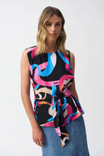Load image into Gallery viewer, Add a touch of bold sophistication to your wardrobe with the Joseph Ribkoff Woven Abstract Print Top. Featuring a sleeveless design, scoop neckline, and an elegant front sash, this standout piece combines vibrant style with unmatched comfort. The striking abstract print is perfect for spring and summer.