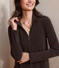 Load image into Gallery viewer, Woman wearing a brown zip-up dress against a beige wall.