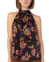 Load image into Gallery viewer, A beautiful black base with vibrant neon floral pattern in lime green, yellow, purple, turquoise and orange creates a stunning mock neck top. A dramatic finishing touch is a tie at the base of the neck. With a fabric that is soft and cool to the touch, you will not only be stylish but comfortable at the same time.