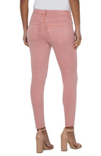 Load image into Gallery viewer, Liverpool's classic Abby Skinny is now in a color that we just adore! A beautiful vibrant wash in rose blush color just catches the eye! With its amazing stretch and recovery, this Abby Skinny will easily become one of your favorites. Pair with your choice of top and sandal for a perfect spring/summer outfit. Color- Rose Blush. Mid-rise. Cut hem. Amazing stretch and recovery.