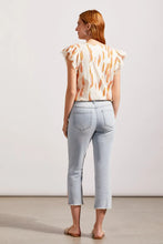 Load image into Gallery viewer, ur Silvia is a super stylish and undeniably comfortable straight-leg jean with a mid-rise fit. The stand-out feature are the side slits at the hem emphasized with embroidered light orange and bright pink detailing. A perfect jean that goes with so many tops including our Farah Flutter Sleeve Textured Blouse with Tassels by Tribal (pictured) Color - Coastline; Light blue. Side slits with embroidery in light orange and bright pink. Mid-rise. Zipper and button closure. Functional front and back pockets.